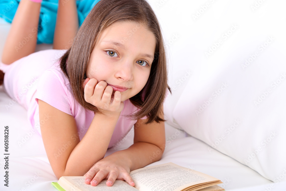Beautiful little girl sitting