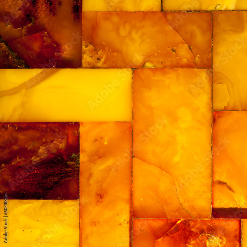 Photo Closeup of golden amber mosaic as background or texture. Gem.