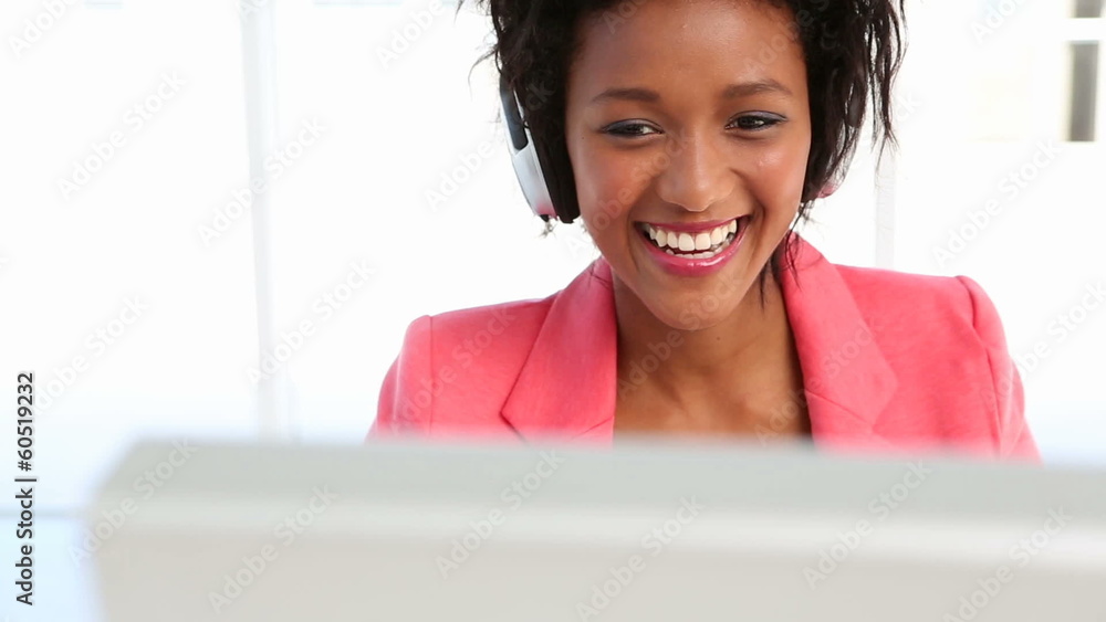 Happy editor working and singing along to music Happy editor working and singing along to music