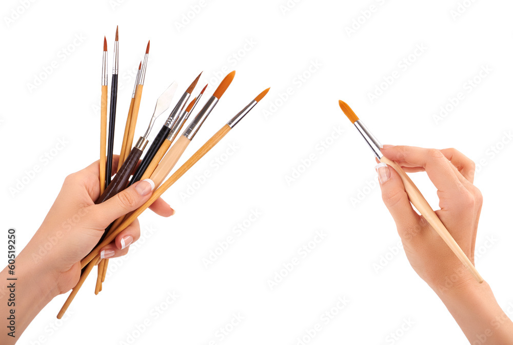 Naklejka premium Hand with a brush