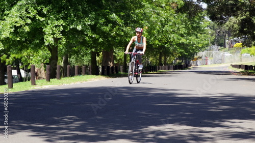 Wallpaper Mural Woman on a bike ride in the park Torontodigital.ca
