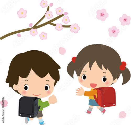 ランドセルを背負った子供たちと桜