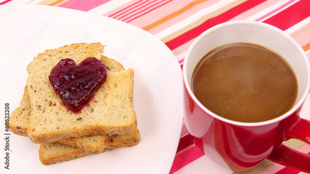 A breakfast scene with a heart of red jam. Be my valentine A breakfast scene with a heart of red jam. Be my valentine