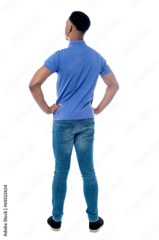 Back pose of smart young guy Back pose of smart young guy
