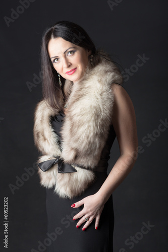 girl in black dress with fur