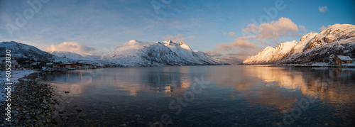 Panoramic view of snowy mountain reflection,Norway