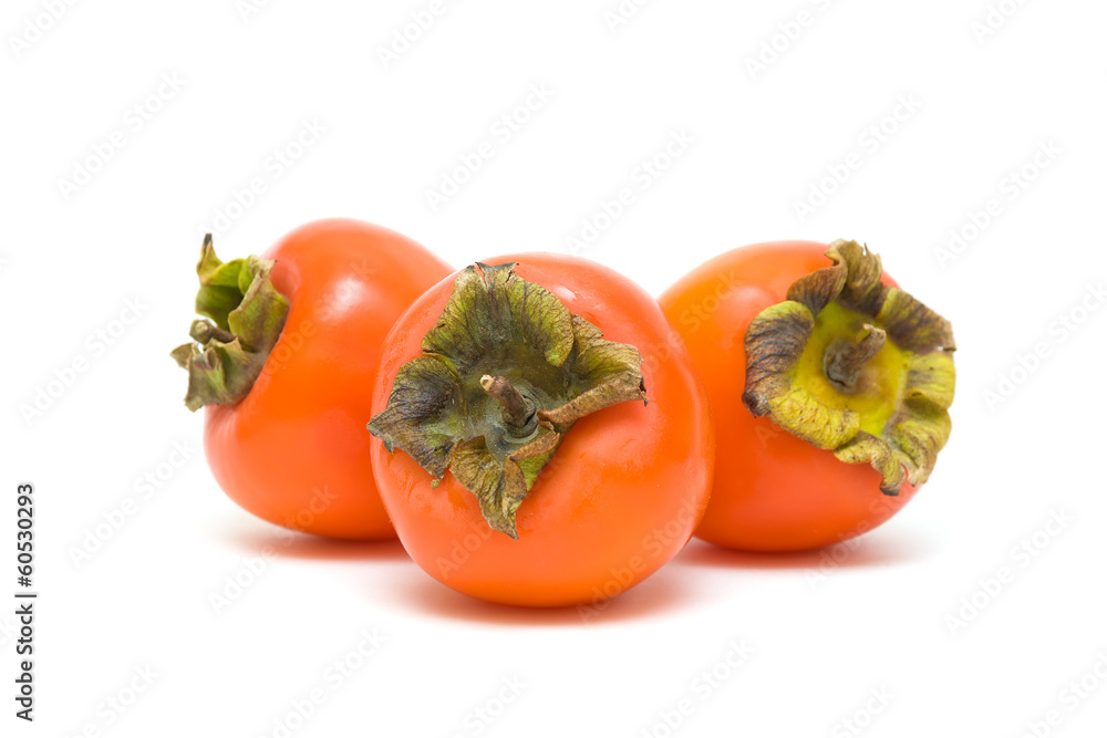 persimmon close up isolated on white background persimmon close up isolated on white background