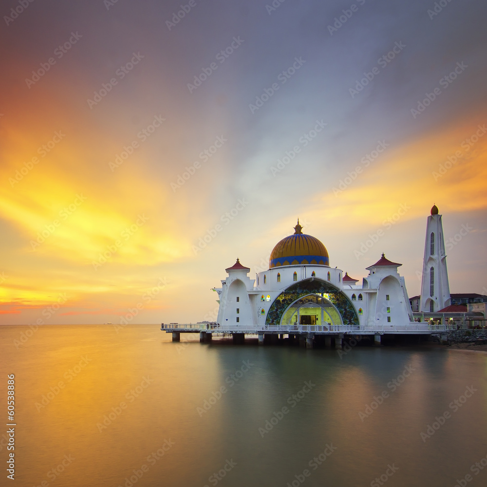 a panoramic view of floating public mosque during awesome sunset