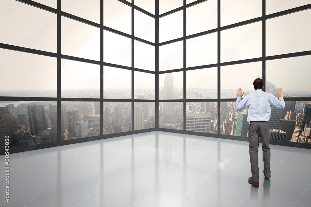 Composite image of businessman posing with hands up Composite image of businessman posing with hands up