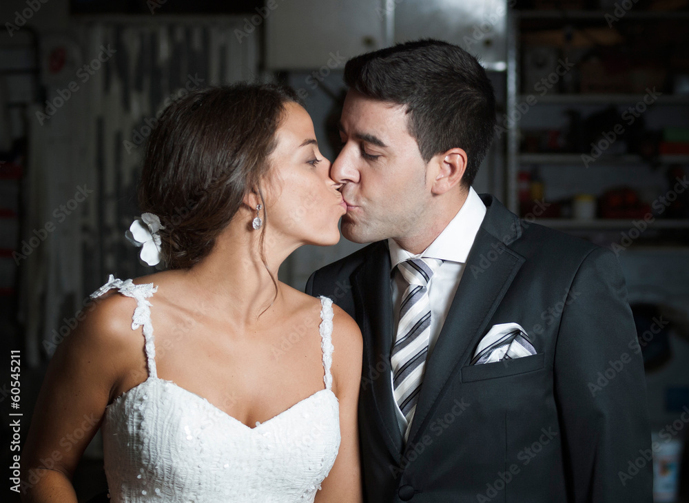 bridal couple kissing each other bridal couple kissing each other