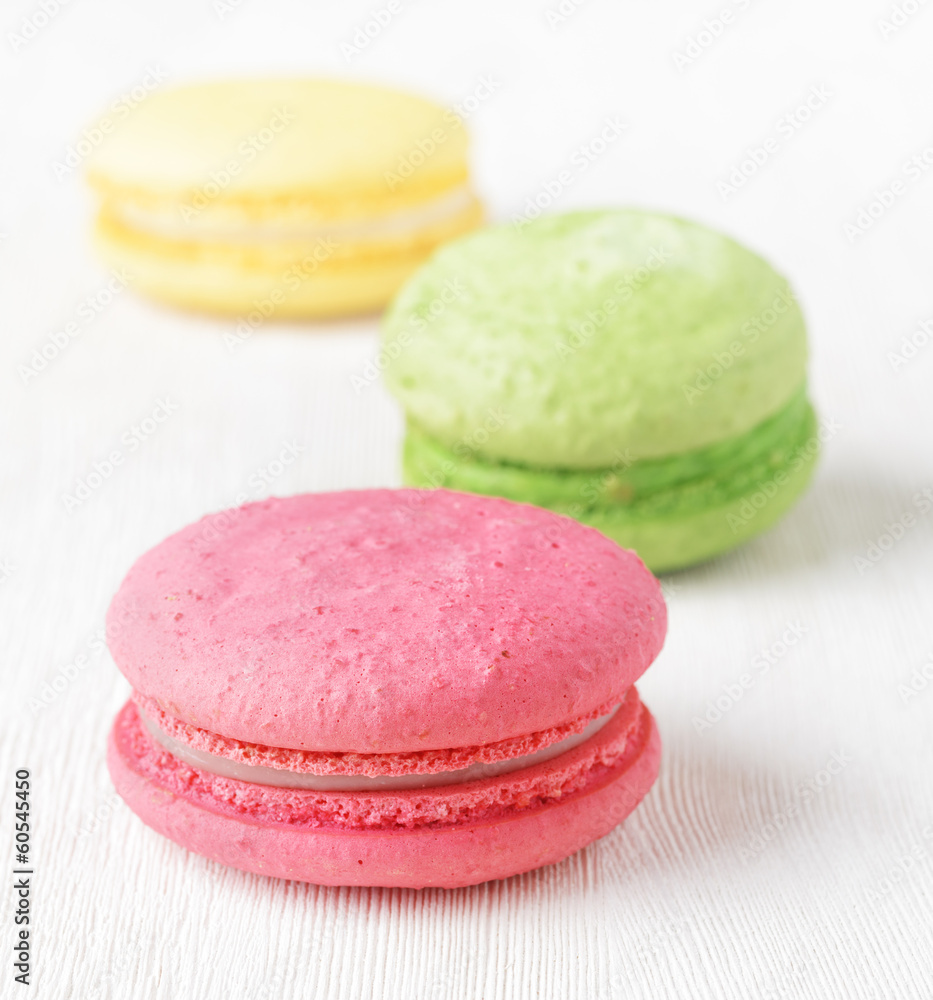 Macaron on white wooden table Macaron on white wooden table