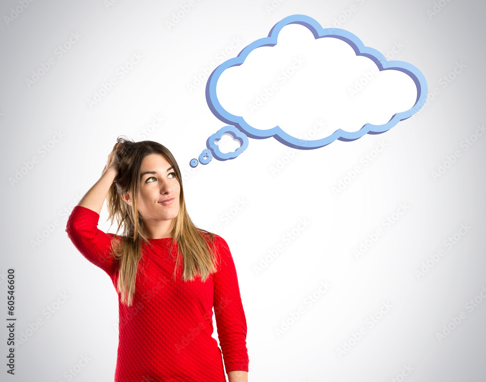Young girl thinking over isolated grey background Young girl thinking over isolated grey background
