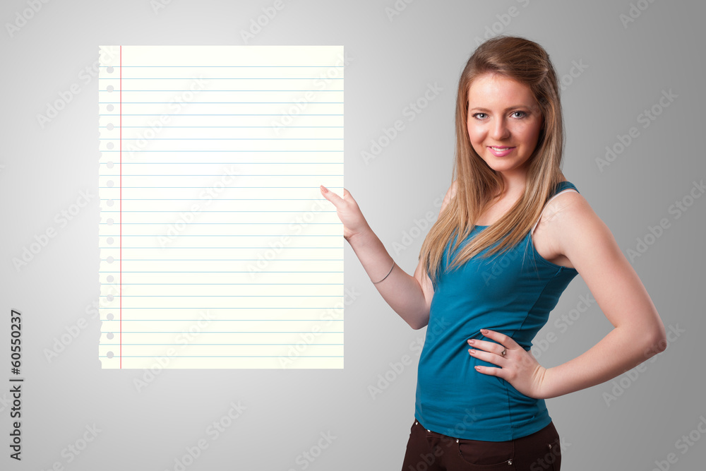 Young woman holding white paper copy space with diagonal lines Young woman holding white paper copy space with diagonal lines