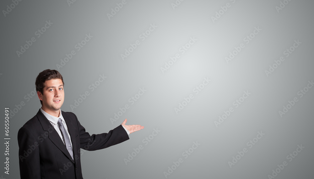 handsome man presenting copy space handsome man presenting copy space