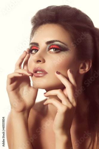 Portrait of beautiful young woman with makeup