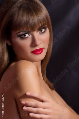 Portrait of beautiful young woman with makeup