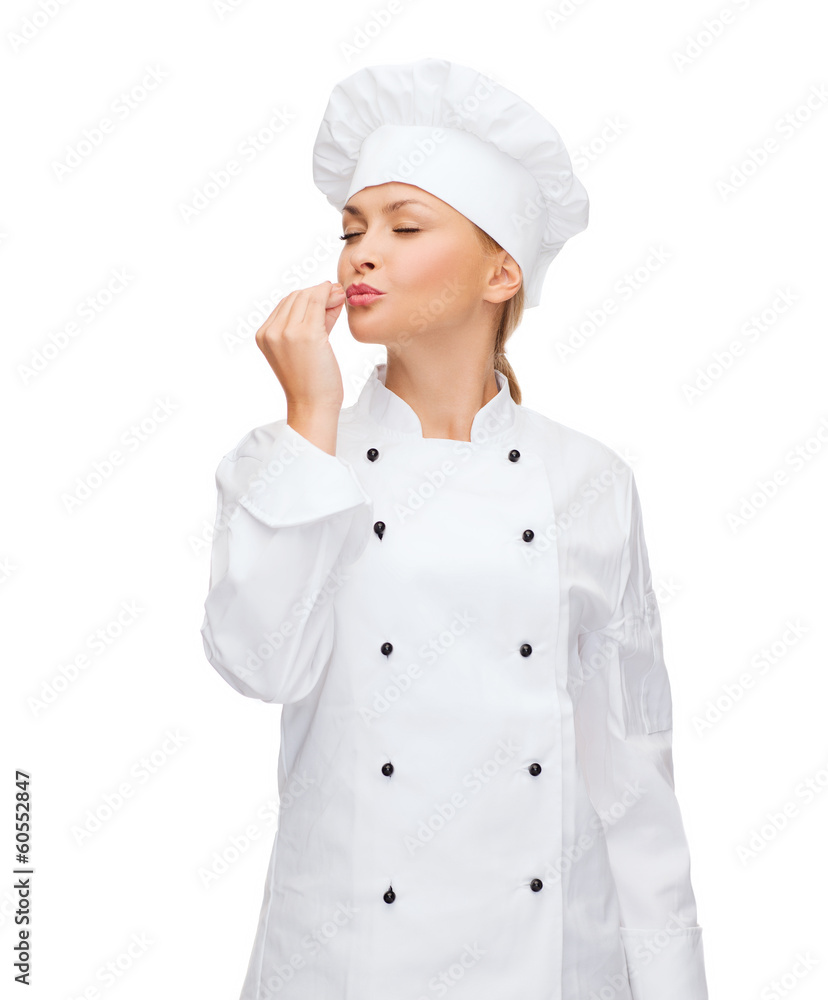 smiling female chef showing delicious sign smiling female chef showing delicious sign