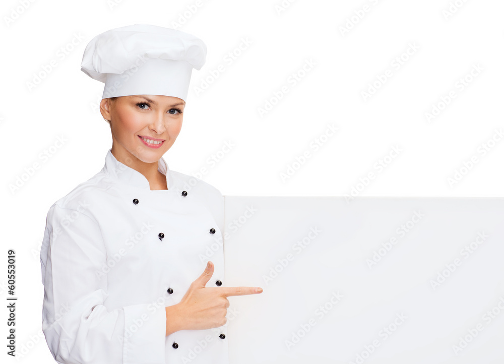 smiling female chef with white blank board smiling female chef with white blank board