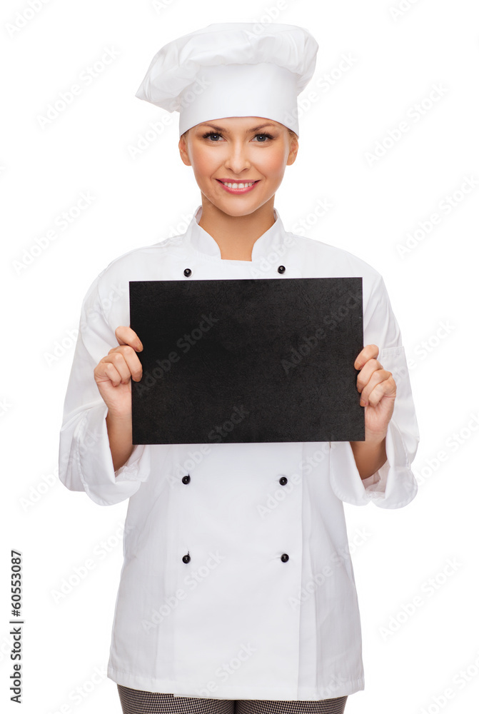 smiling female chef with black blank paper smiling female chef with black blank paper