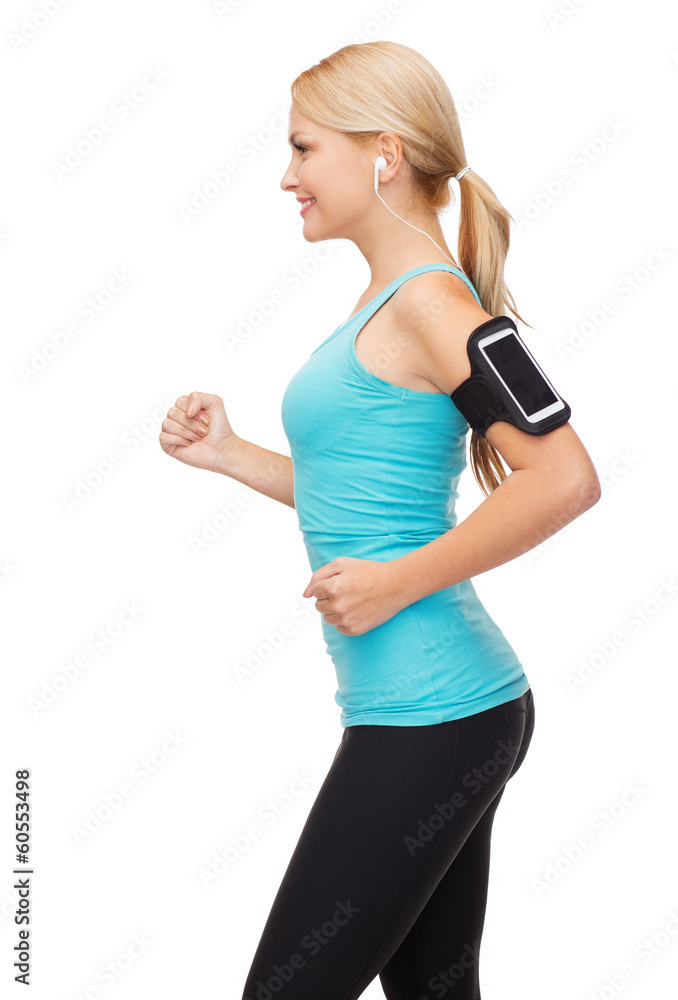 sporty woman running with smartphone and earphones sporty woman running with smartphone and earphones