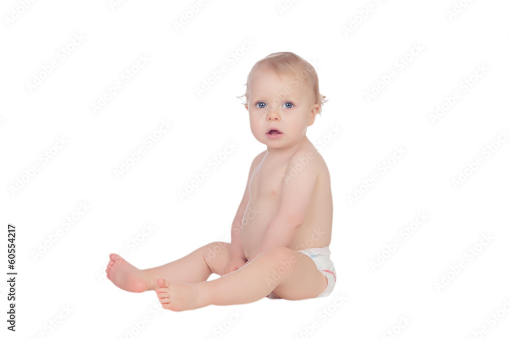 Adorable blonde baby in diaper sitting on the floor Adorable blonde baby in diaper sitting on the floor