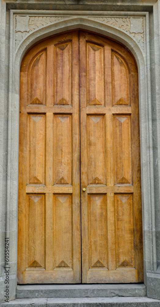 Arched wooden doorway