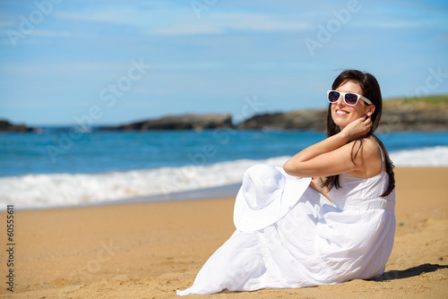 Romantic woman on summer beach vacation © Dirima