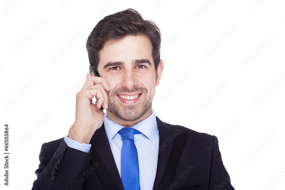 Handsome business man talking on the phone, isolated on a white Handsome business man talking on the phone, isolated on a white
