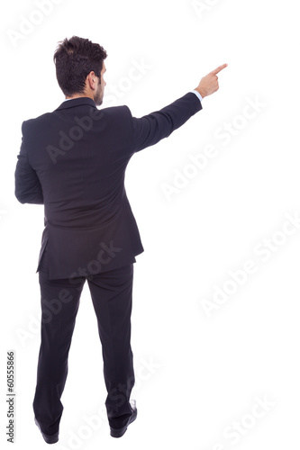 Business man pointing at something, isolated on white backgroun