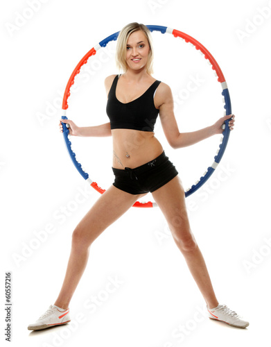 young fitness woman with hula hoop isolated
