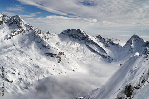 Aerial view of snow covered alps mountain in winter