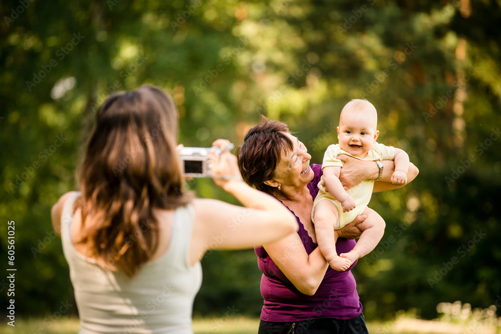 Obraz premium Precious memories - grandmother with baby