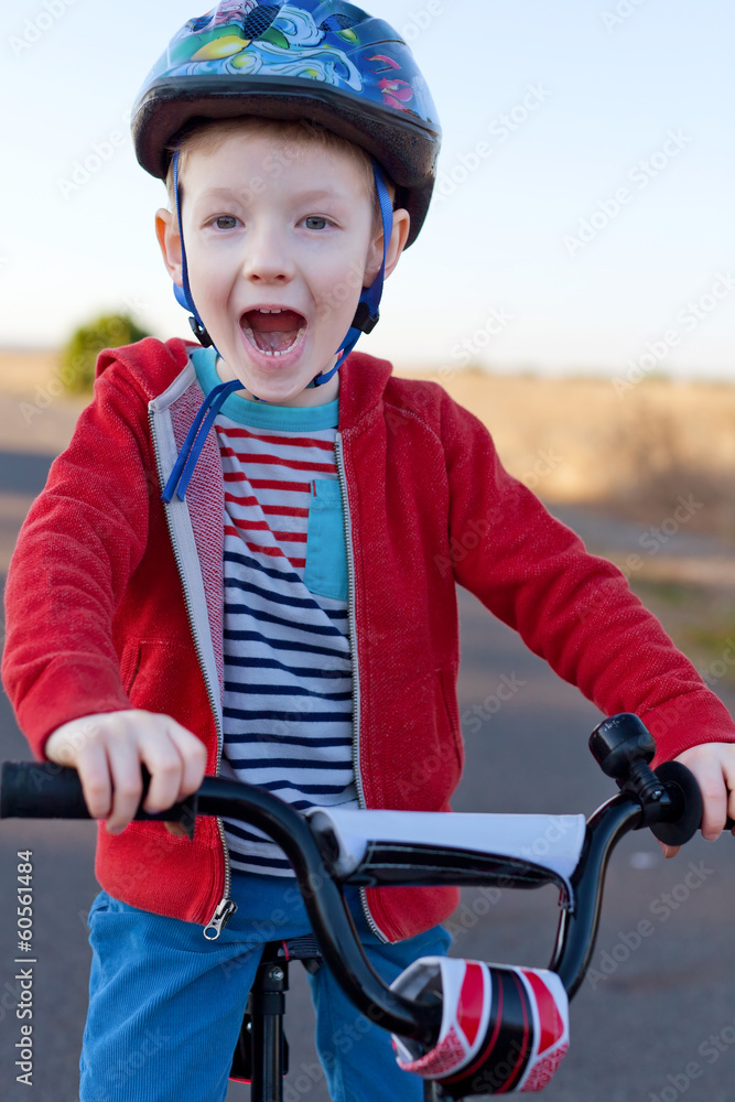 Naklejka premium kid riding bike