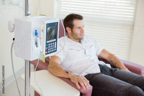 IV Drip Attached To Patient's Hand During Chemotherapy photo