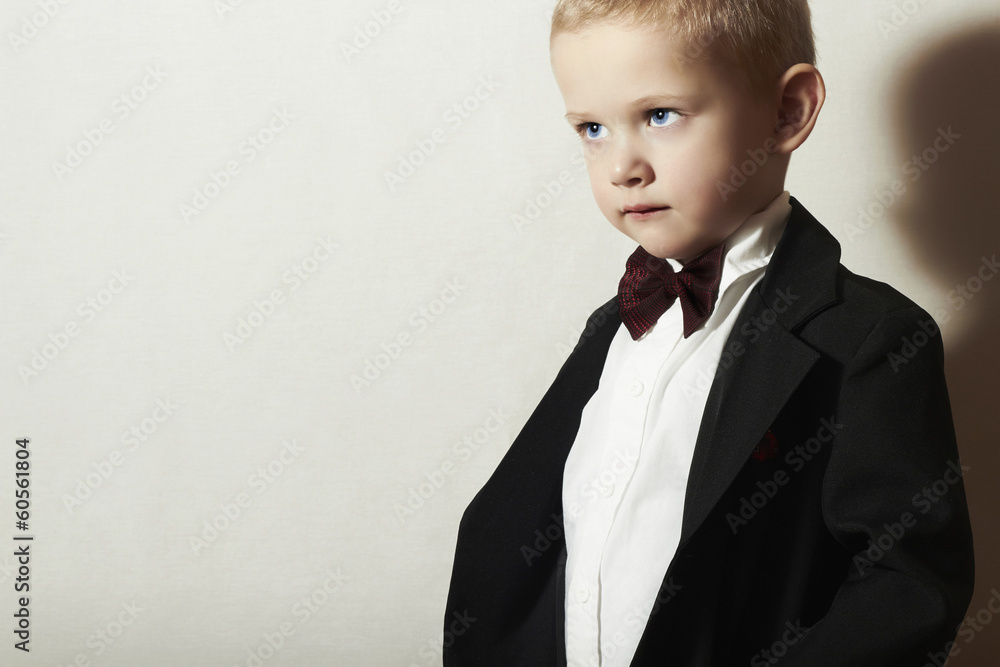 Fashionable Little Boy in Black Suit.Stylish fashion children. Fashionable Little Boy in Black Suit.Stylish fashion children.