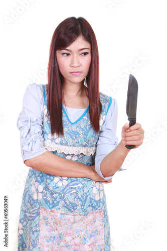 female chef holding a carving knife