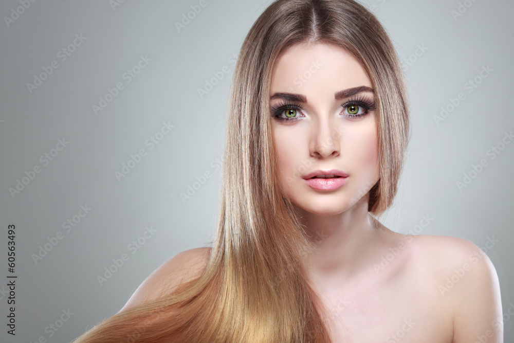 Beautiful girl on a light-grey background, emotions, cosmetics Beautiful girl on a light-grey background, emotions, cosmetics