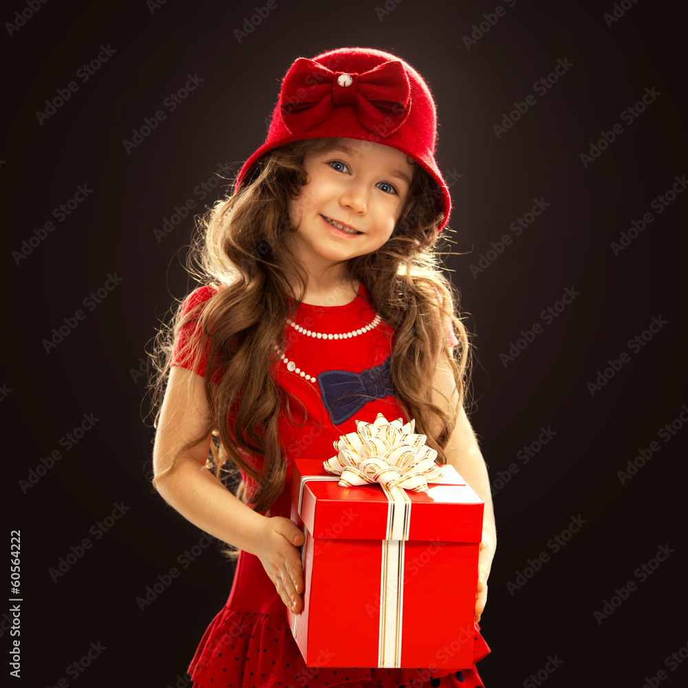 Happy child girl with gift box Happy child girl with gift box