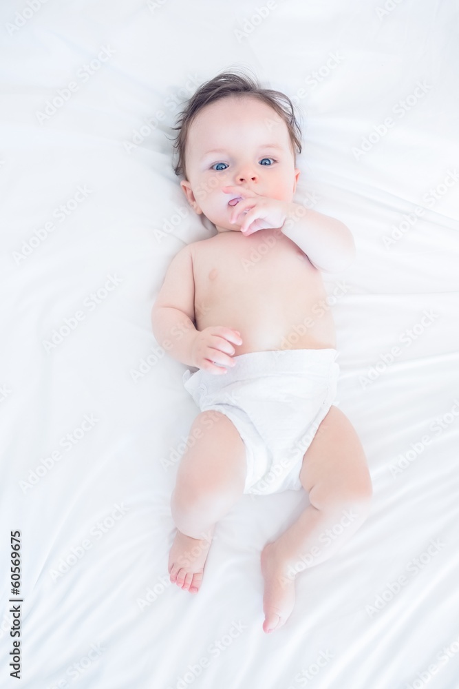 Innocent baby with finger in mouth Innocent baby with finger in mouth
