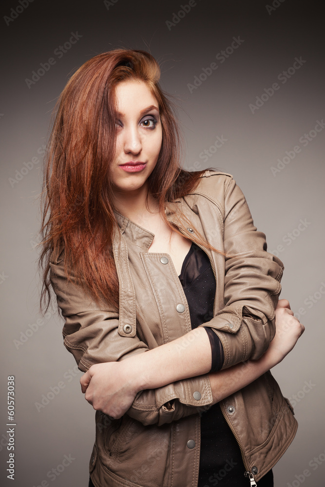 Fototapeta premium Girl in a leather jacket represents model