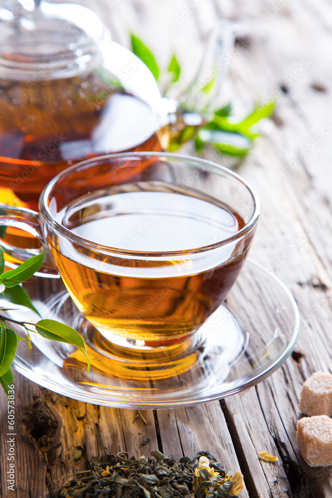 Transparent cup of green tea Transparent cup of green tea