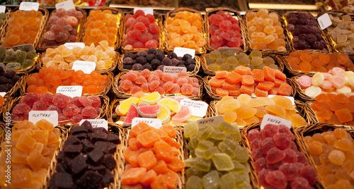 Show-window with multi-colored fruit jelly in the market
