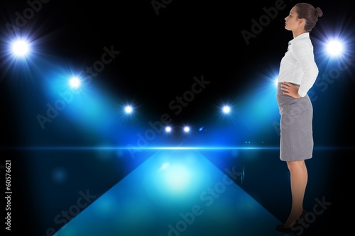 Composite image of focused businesswoman