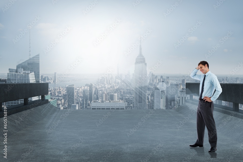 Composite image of thoughtful businessman with hand on head Composite image of thoughtful businessman with hand on head