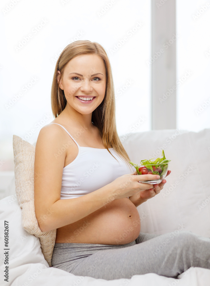 happy pregnant woman with bowl of salad happy pregnant woman with bowl of salad