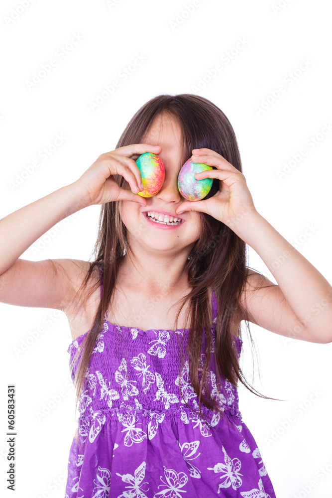 Cute girl keeping two decorated easter eggs Cute girl keeping two decorated easter eggs