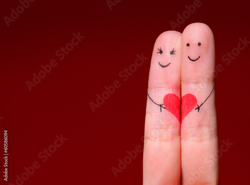 Photo Happy Couple Concept. Two fingers in love with painted smiley