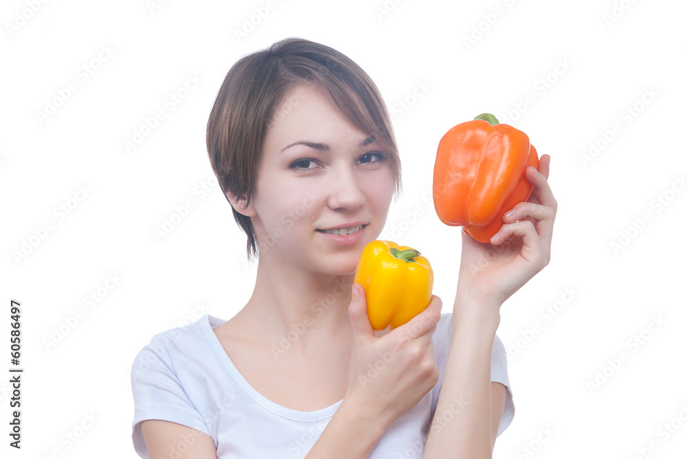 Pretty young girl with red and yellow peppers Pretty young girl with red and yellow peppers