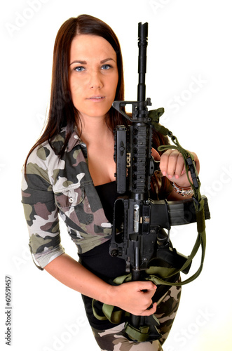 beautiful sexy girl holding gun