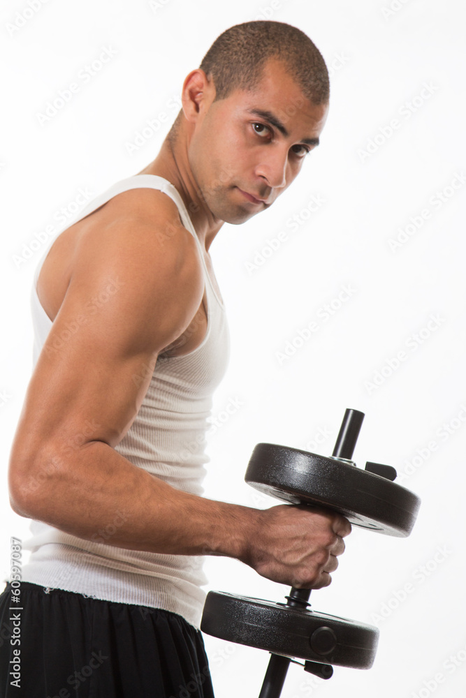 Physically fit hispanic man working out Physically fit hispanic man working out